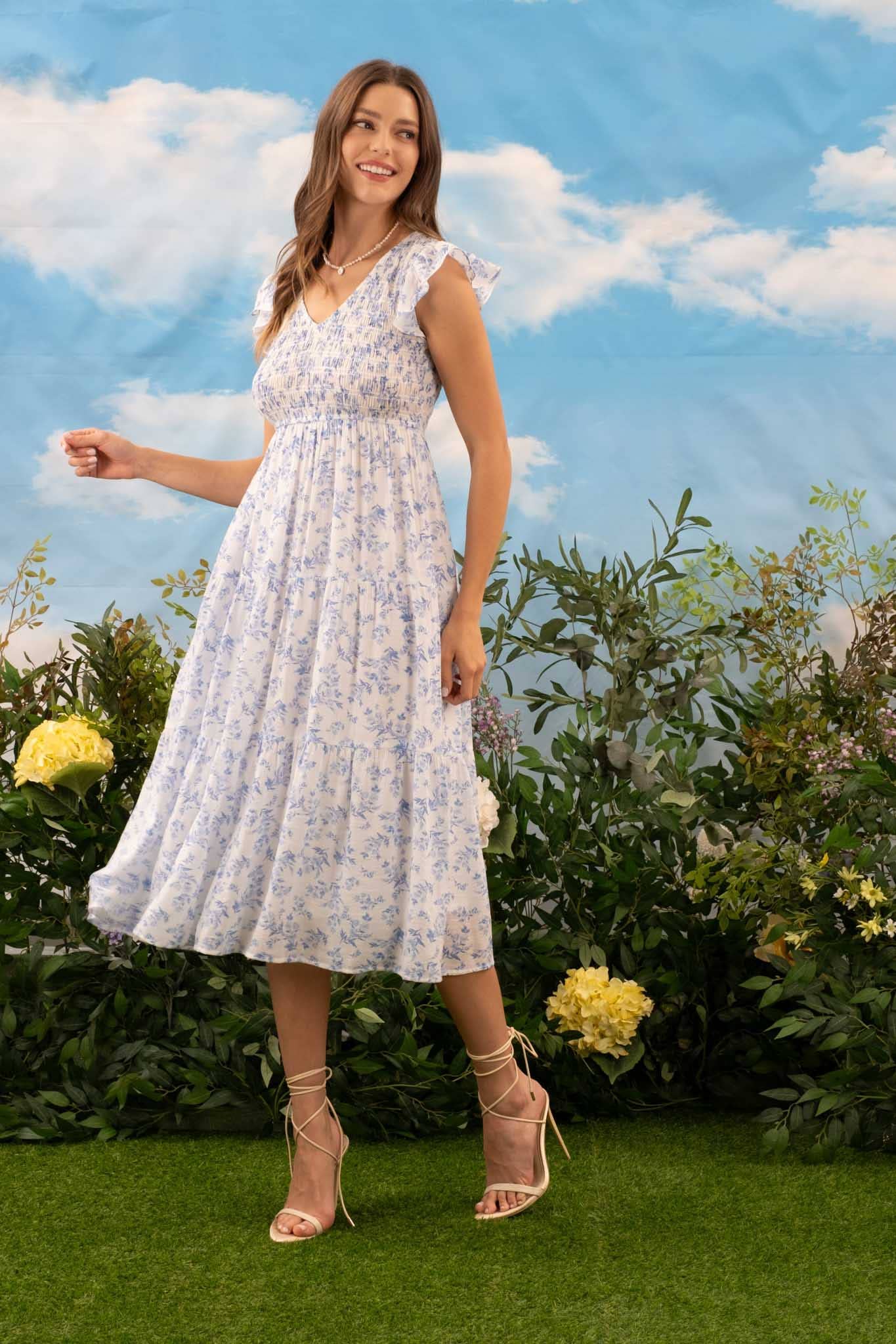 FLORAL V NECK SMOCKED SHORT SLEEVE MIDI DRESS