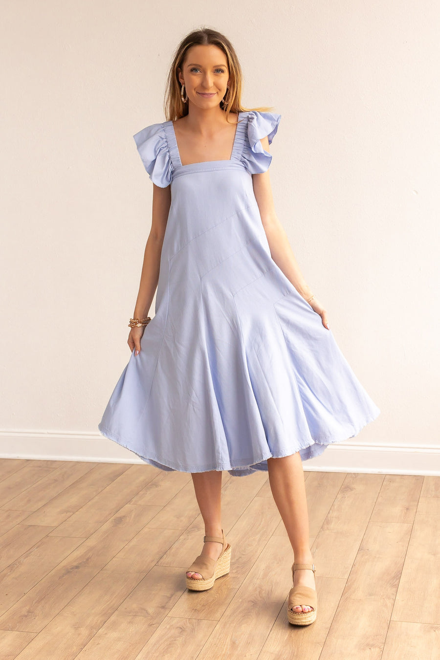 THE STELLA BLUE LINEN VERSI DRESS