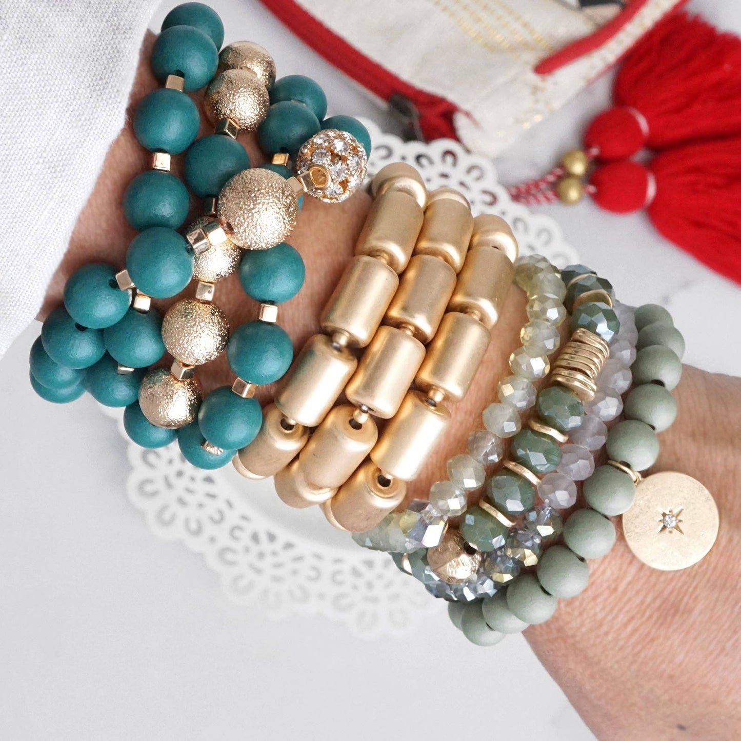Beaded bracelets stack in Olive green with a coin charm